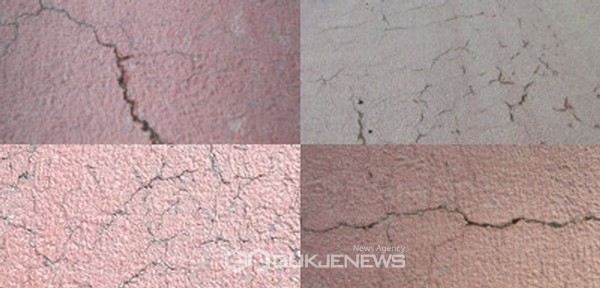 ▲ 화성남양뉴타운 7공구 현장 앞에서 LH9단지 방향으로 이어지는 도로가 토석을 운반하는 덤프트럭 운행으로 곳곳에 균열이 생기는 등 파손돼 있다.(사진=김정기 기자)